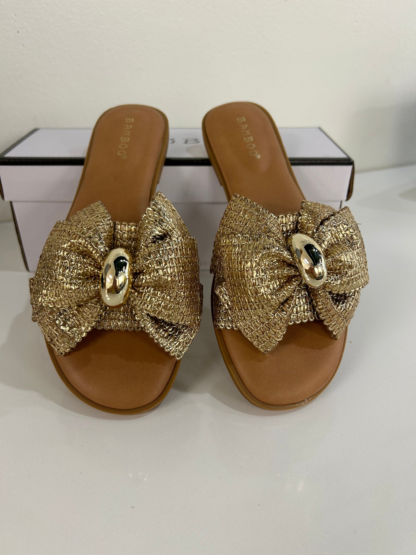 GOLD BOW SANDALS